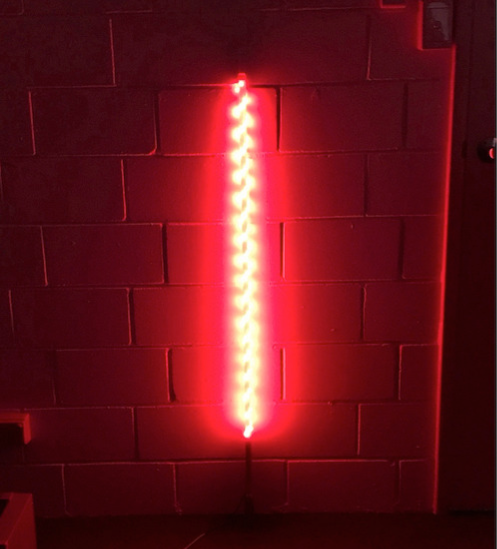 Red spiral LED whip, designed for enhancing the visibility and safety of off-road vehicles with its vibrant and flexible lighted design.
