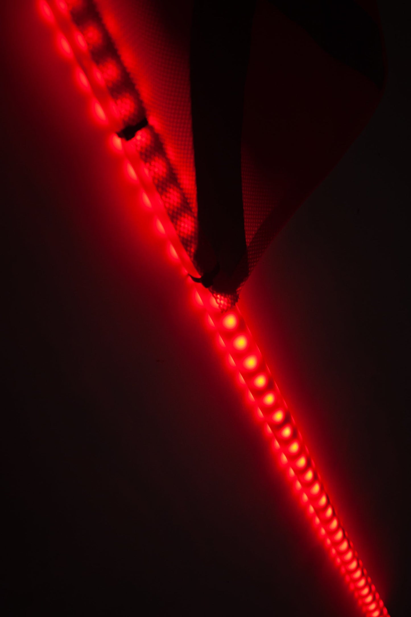 LED whip fully illuminated, providing bright and colorful lighting to improve the visibility and safety of vehicles, especially in low-light conditions.