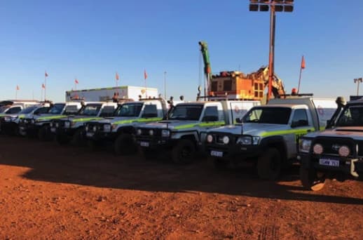 Vehicle safety flag pole on a mining site, ensuring visibility and safety in hazardous environments.